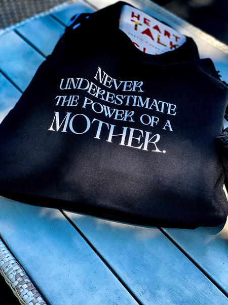 NEVER UNDERESTIMATE THE POWER OF A MOTHER TOTE